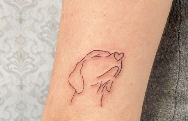 Tatuaje de perro silueta