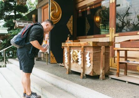 Justin McCurry takes Hammy to a Shinto shrine to pay their respects.