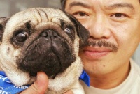 日本举办“相似者宠物比赛” 人面狗脸相映红